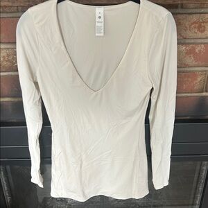 Lululemon Athletica Cream Long Sleeve Top